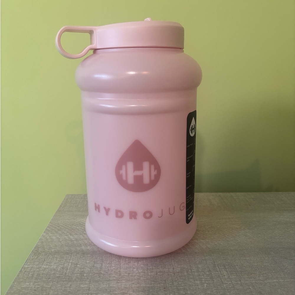 Hydrojug 73 oz bottle with flip straw. New. Pink